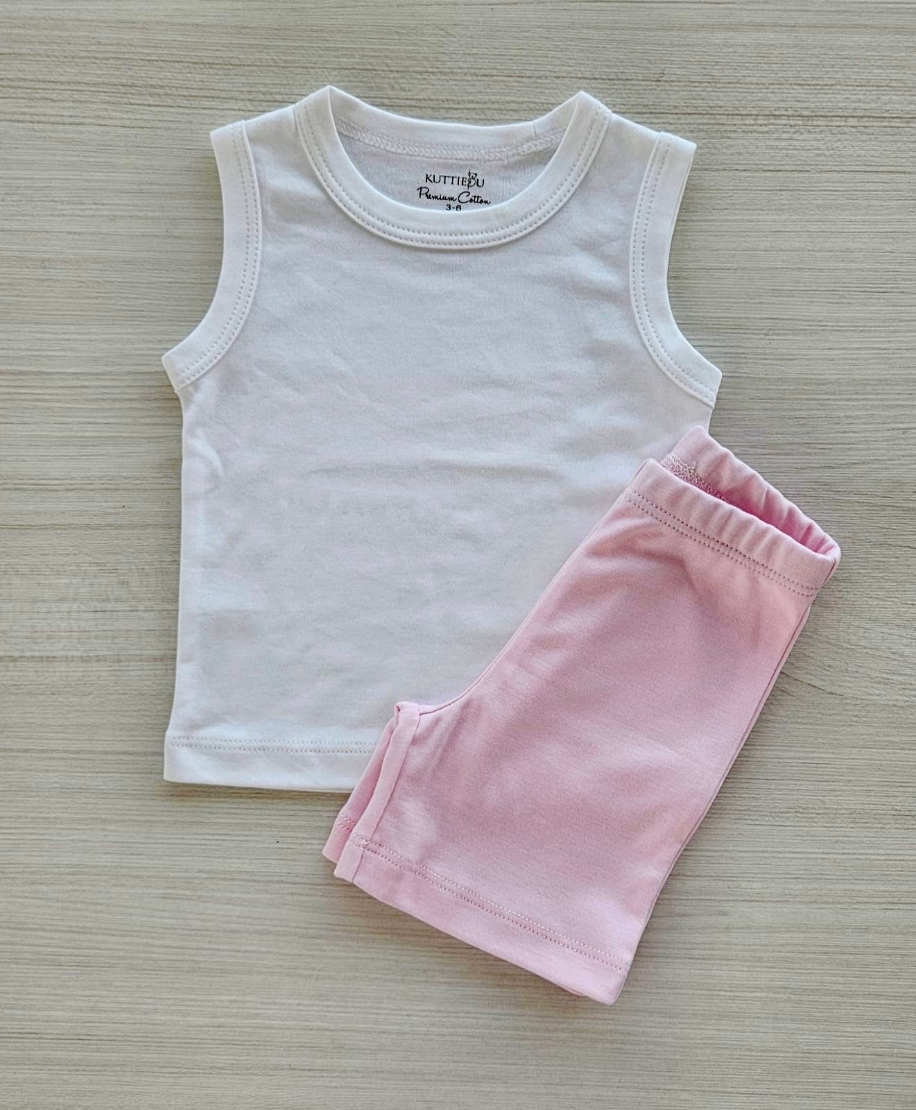 Sleeveless Top + Pink Pants